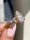 caption:Shown with 3ct pear in 18k yellow gold