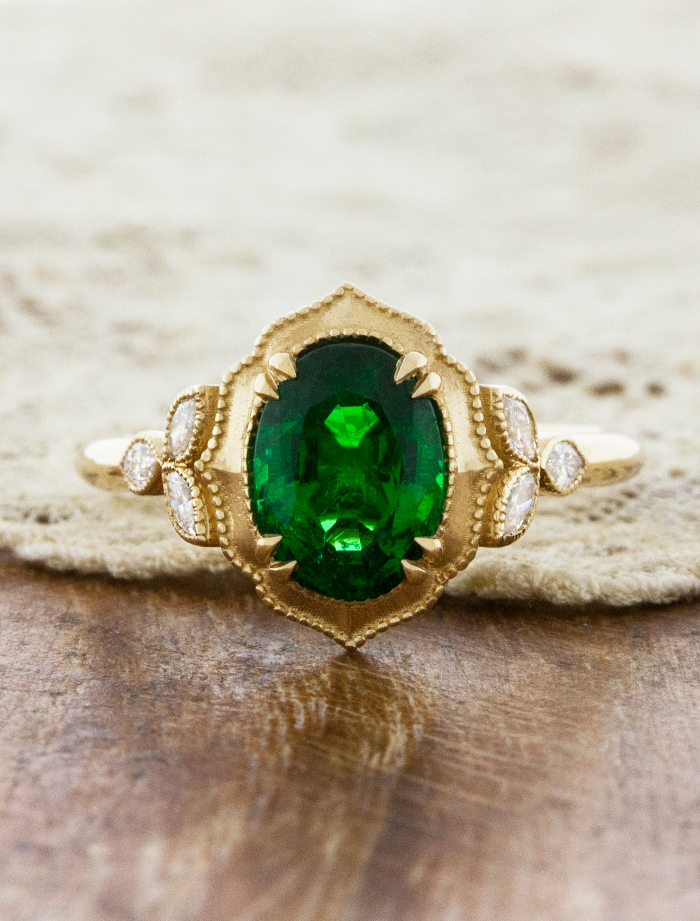 caption:Shown with 1.3ct oval emerald in 14k yellow gold