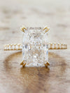 caption:Shown with 3.2ct radiant cut diamond in 14k yellow gold