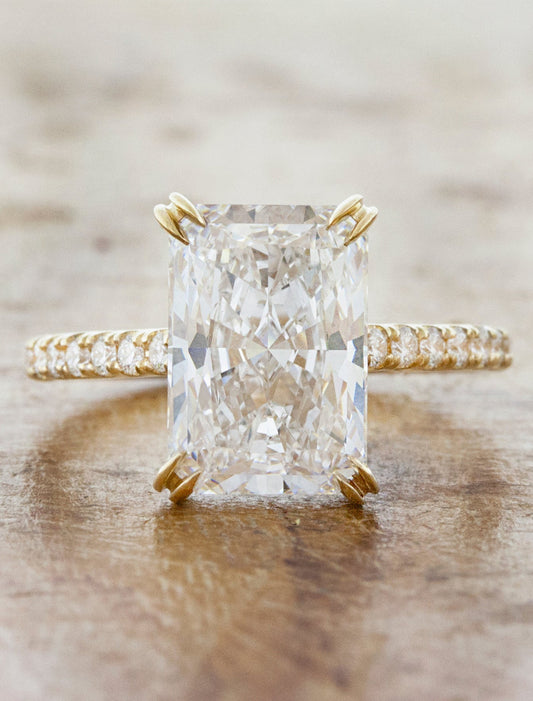 caption:Shown with 3.2ct radiant cut diamond in 14k yellow gold