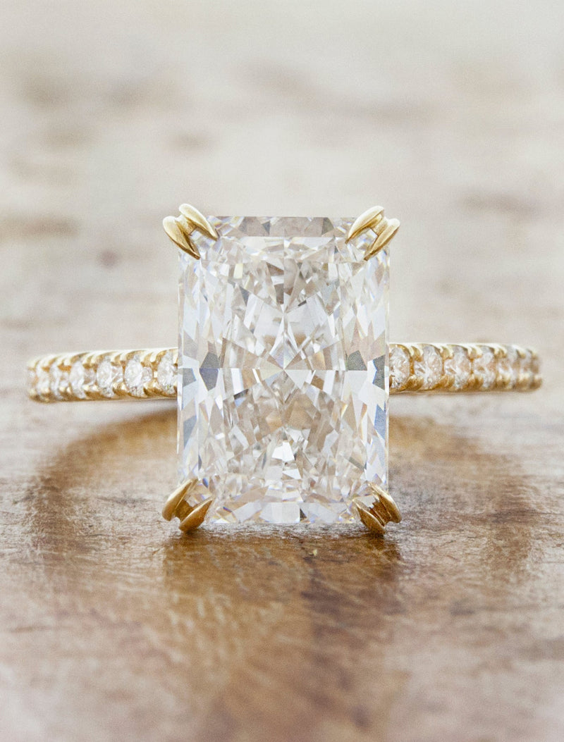 caption:Shown with 3.2ct radiant cut diamond in 14k yellow gold