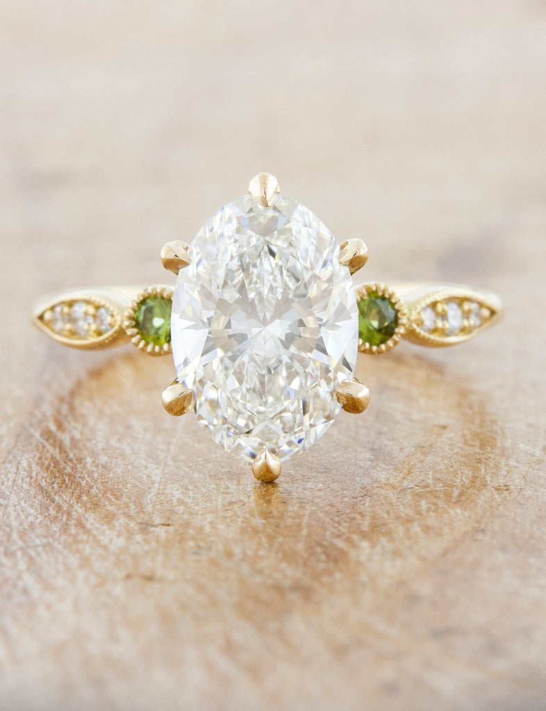 caption:Shown with 2.50ct diamond, customized with green sapphire