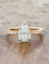 caption:Shown with 1.21ct pear diamond in mixed 14k rose gold & platinum