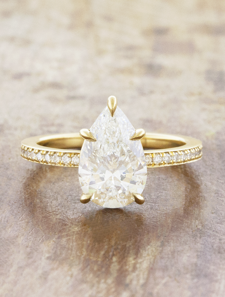 caption:Shown with 2ct pear in 18k yellow gold