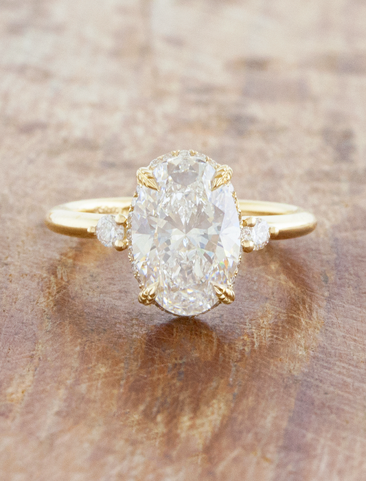 caption:Shown with 2.5ct oval in 14k yellow gold