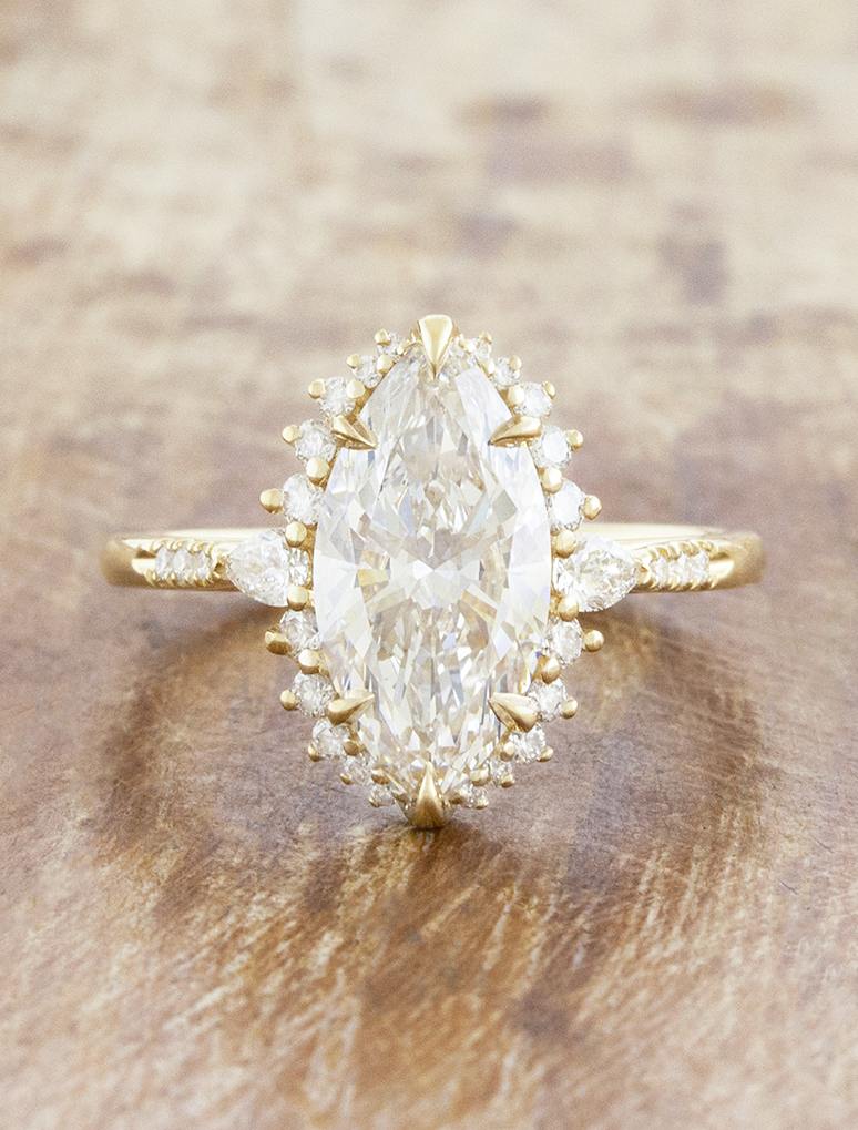 caption:Shown with 2.5ct marquise in 14k yellow gold 