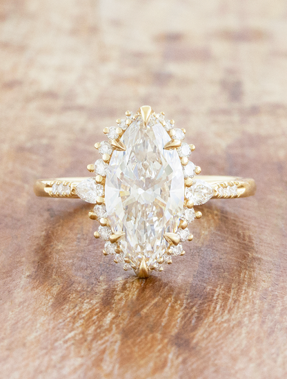 caption:Shown with 2.5ct marquise in 14k yellow gold 