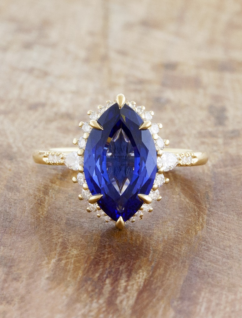 caption:Shown with blue sapphire marquise in 14k yellow gold 