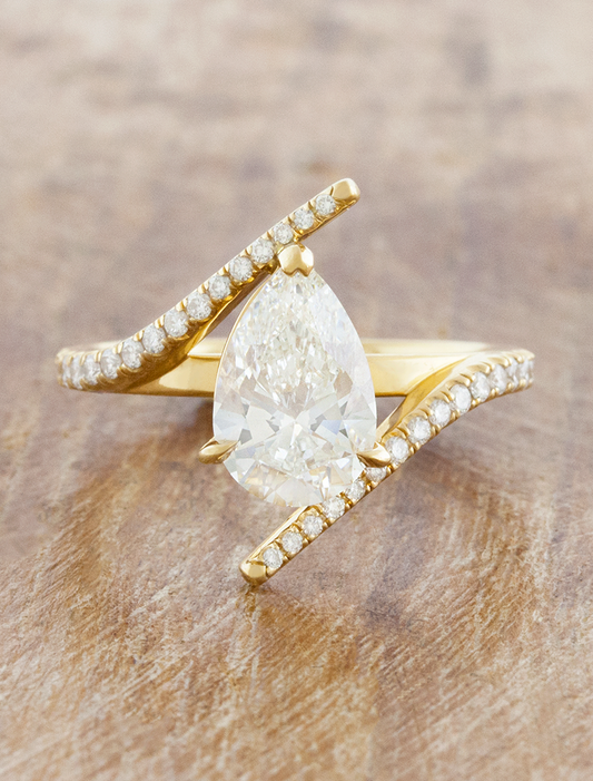 caption:Shown with 2ct pear in 18k yellow gold