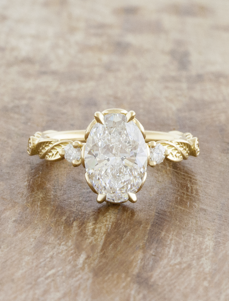 caption:Shown with 1.5ct oval in 14k yellow gold