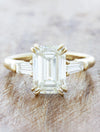 caption:Shown with 3.50ct emerald cut diamond in 14k yellow gold