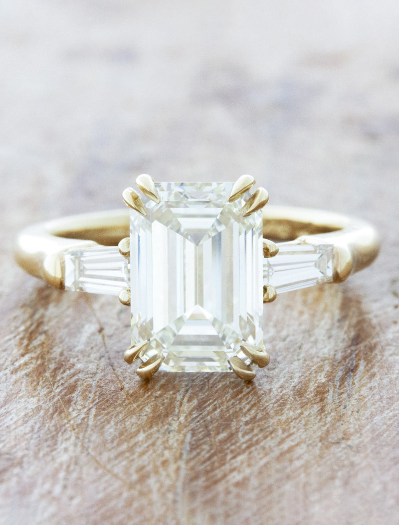 caption:Shown with 3.50ct emerald cut diamond in 14k yellow gold