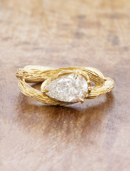 caption:Shown with 1ct pear in 14k yellow gold