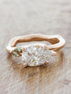caption:Shown with 1.5ct pear diamond in 14k rose gold