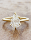 caption:Shown with 2.2ct pear diamond in 14k yellow gold