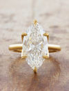 caption:Shown with 4ct marquise diamond in 18k yellow gold