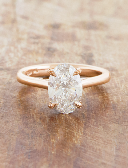 caption:Shown with 1.5ct oval in 14k rose gold 