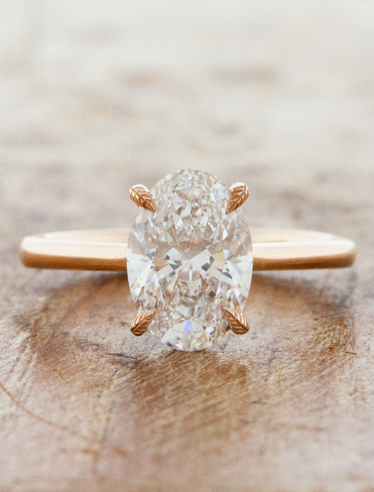 caption:Shown with 2.15ct oval diamond in 14k rose gold