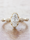 caption:Shown with 1ct marquise diamond in 14k yellow gold
