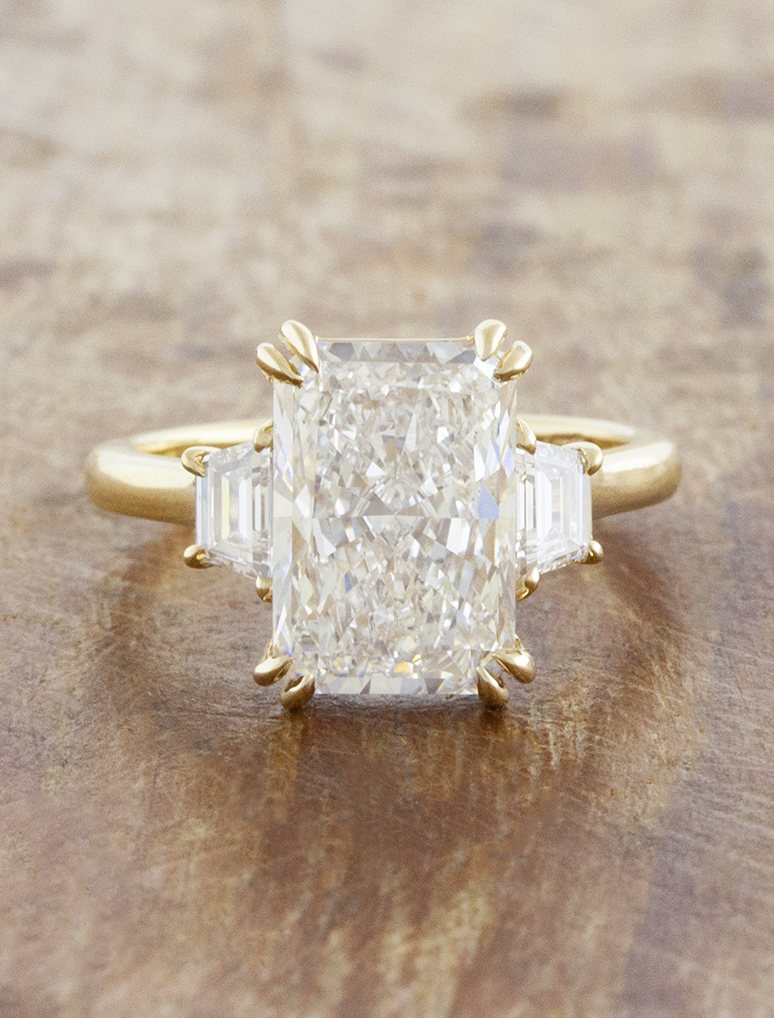 caption:Shown with 3ct radiant cut in 14k yellow gold 