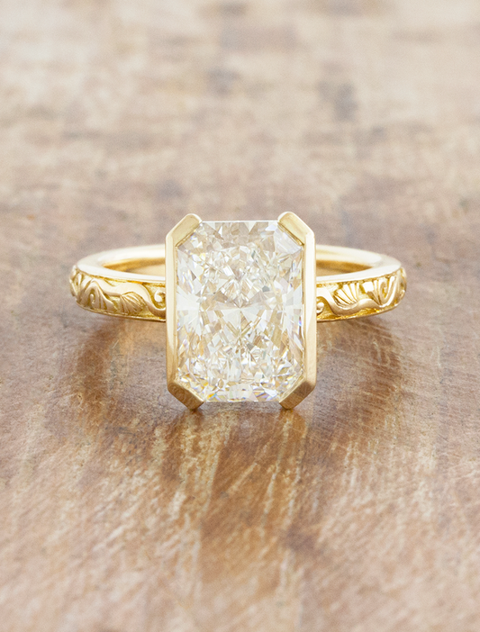 caption:Shown with 3ct radiant cut in 18k yellow gold 