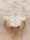 caption:Shown with 3ct radiant cut in 14k yellow gold 