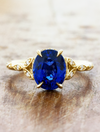 caption:Shown with 3ct blue sapphire in yellow gold