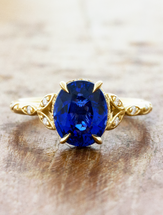 caption:Shown with 3ct blue sapphire in yellow gold