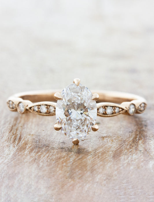 caption:Shown with 1.2ct oval diamond in 14k rose gold