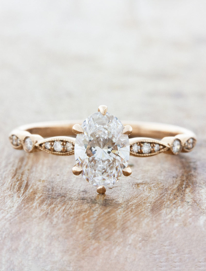 caption:Shown with 1.2ct oval diamond in 14k rose gold