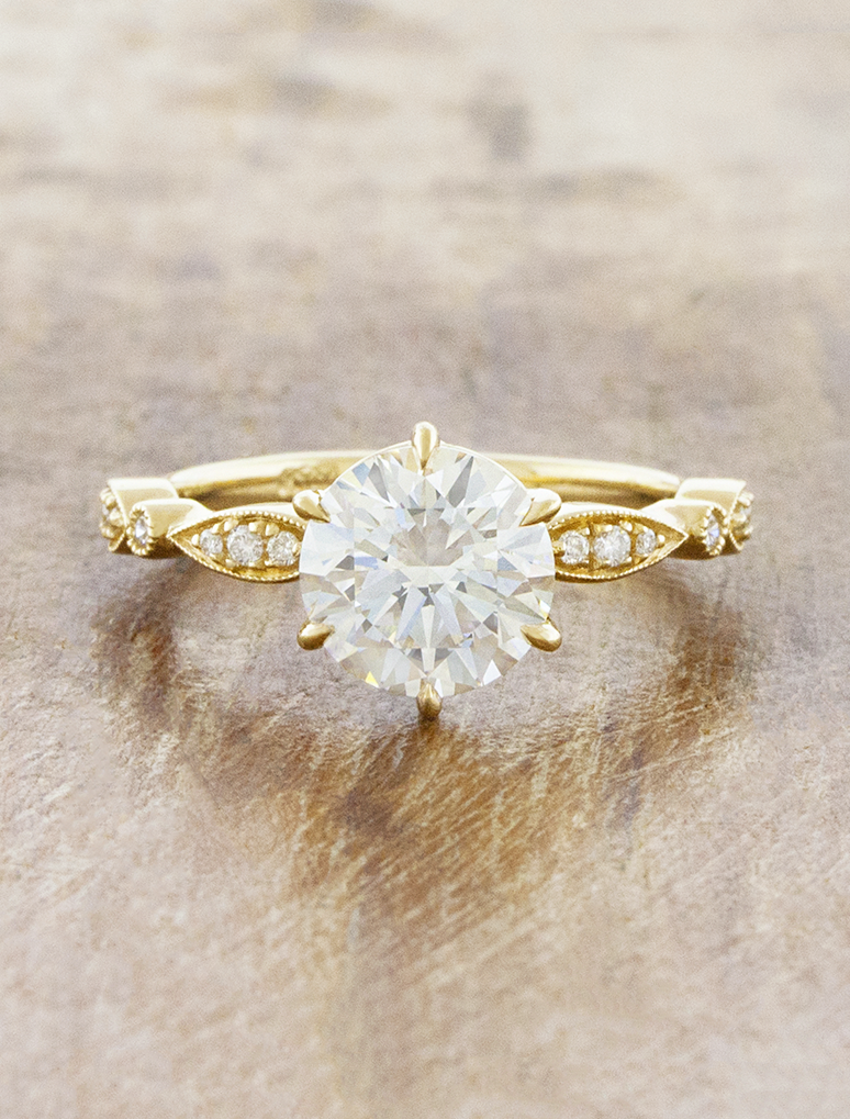 caption:Shown with 2ct round cut in 14k yellow gold 