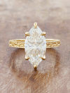 caption:Shown with 3ct marquise in 18k yellow gold 