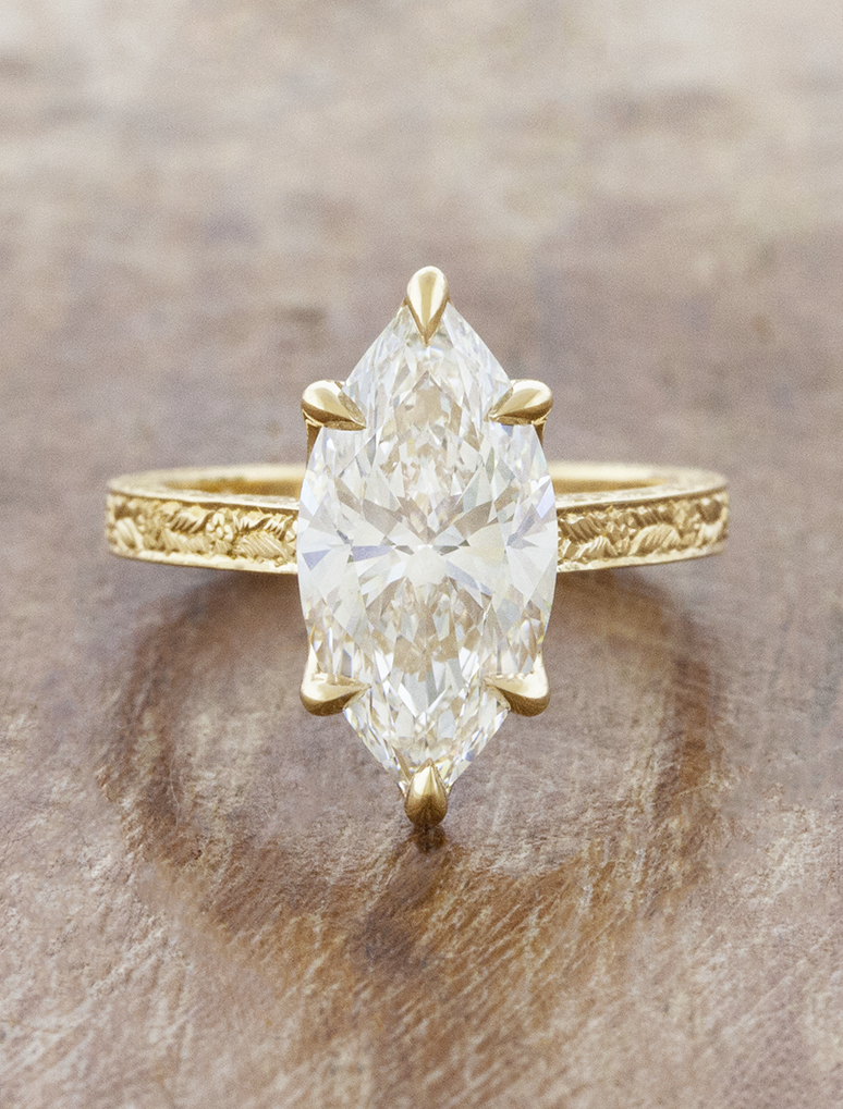 caption:Shown with 3ct marquise in 18k yellow gold 