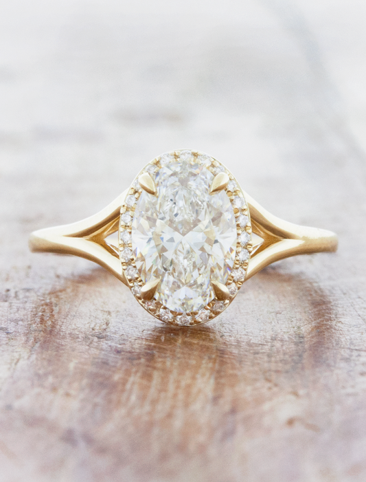 caption:Shown with 1.5ct oval diamond in 14k yellow gold
