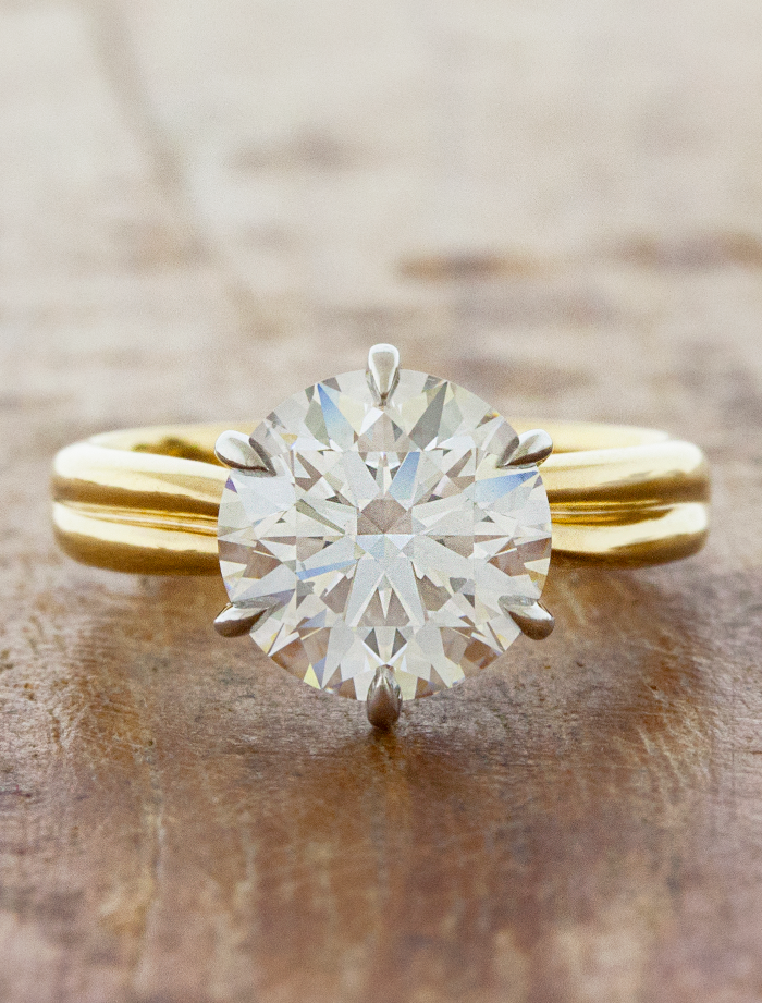 caption:Shown with 3ct round diamond in mixed yellow gold & platinum