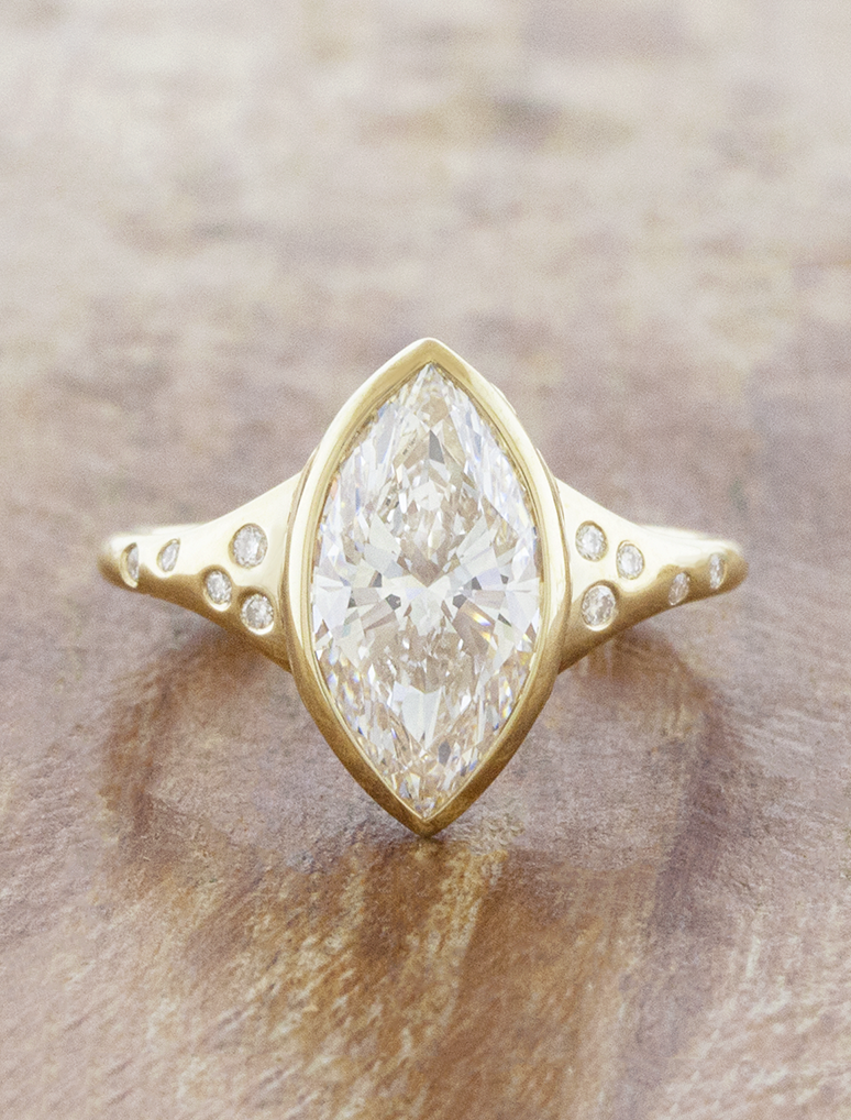 caption:Shown with 2ct marquise in 14k yellow gold 