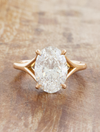 caption:Shown with 2.5ct oval in 18k rose gold, customized with leaf prongs