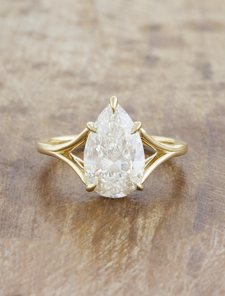 caption:Shown with 2.5ct pear in 14k yellow gold 