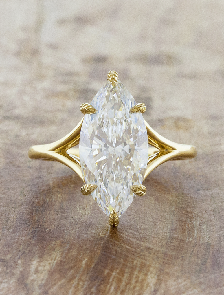 caption:Shown with 4ct marquise diamond in 14k yellow gold 