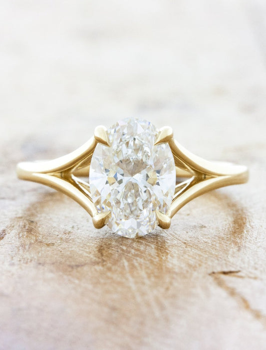caption:Shown with 1.6ct oval in 14k yellow gold