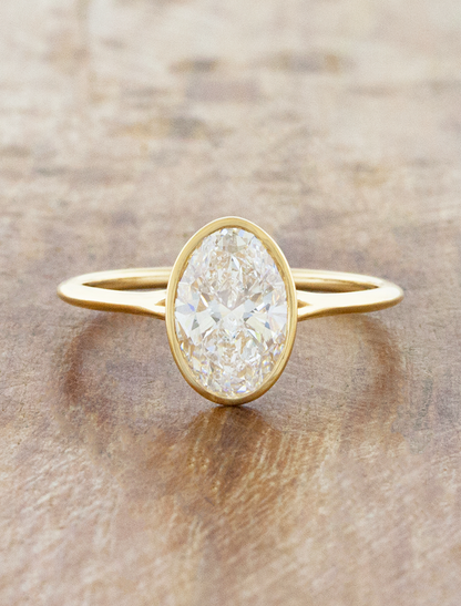 caption:Shown with a 2ct oval in 14k yellow gold