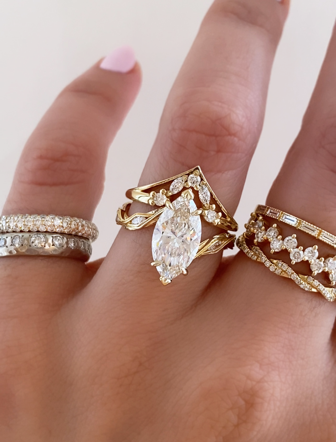 caption:Shown stacked with Nessa 2.5ct marquise