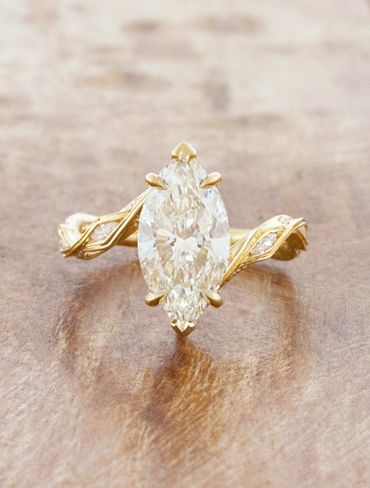 caption:Shown with 2.5ct marquise in 14k yellow gold
