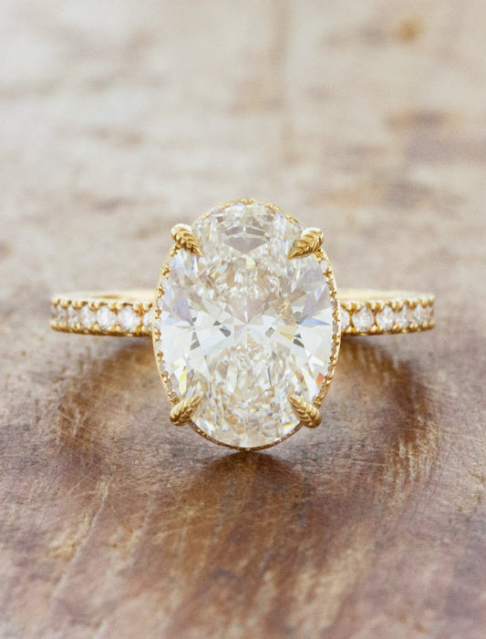 caption:Shown with 3ct oval diamond in 18k yellow gold