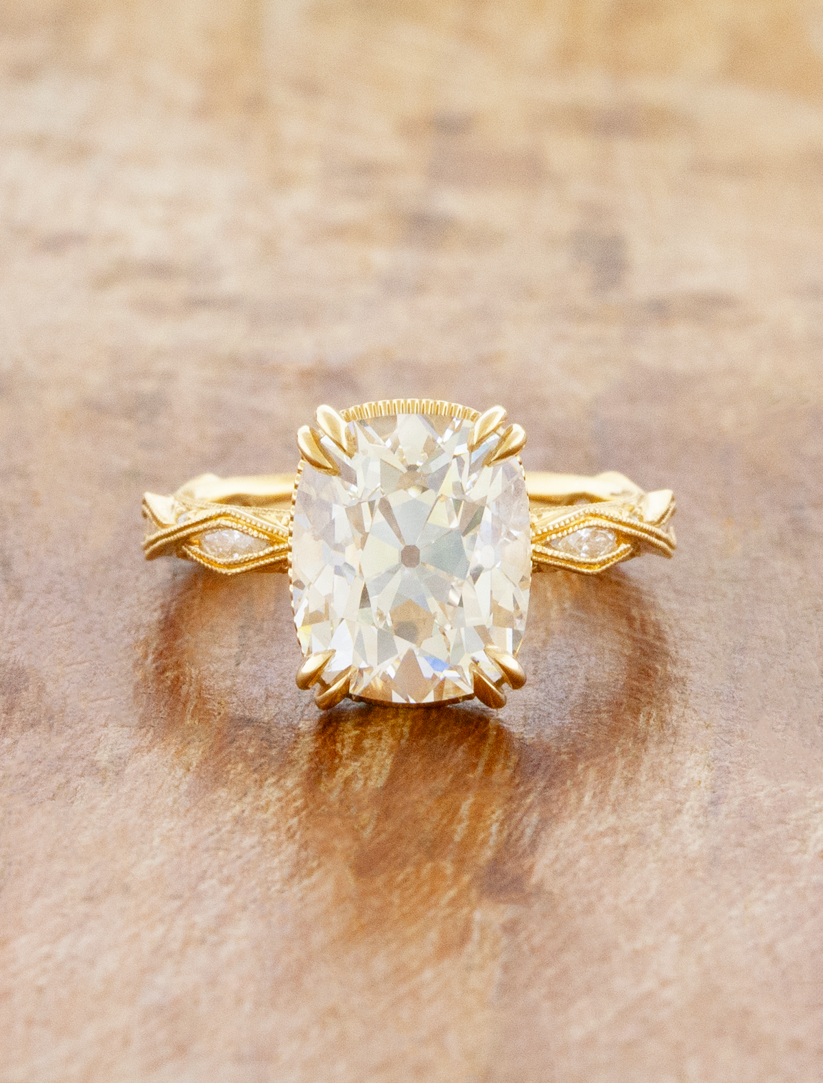 caption:Shown with a 5ct Old Mine Cut diamond in 14k yellow gold