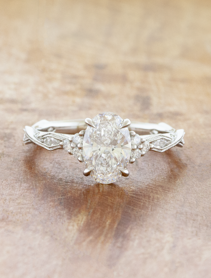 caption:Shown with 1.55ct oval in platinum