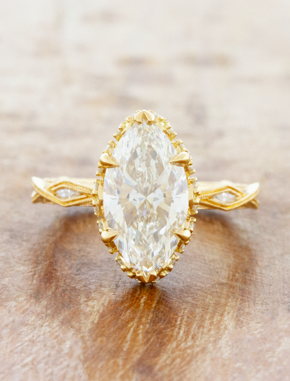 caption:Shown with 3ct marquise in 18k yellow gold 