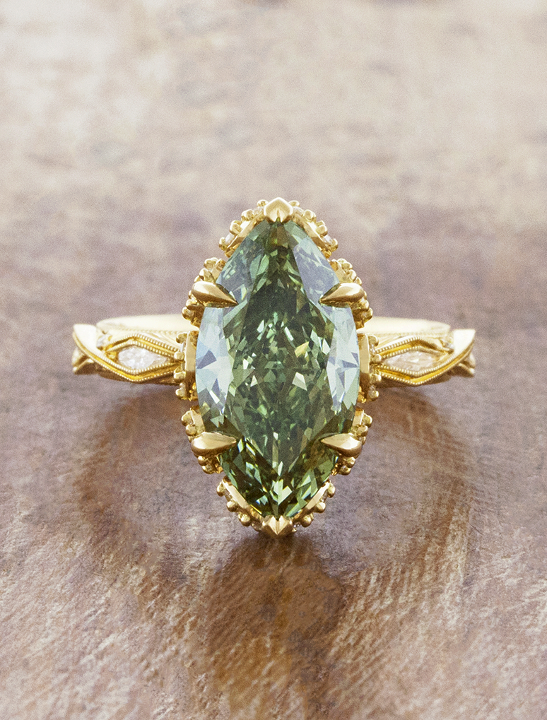 caption:Shown with 4ct fancy green marquise in 18k yellow gold 