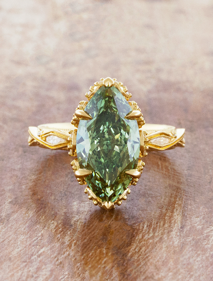 caption:Shown with 4ct fancy green marquise in 18k yellow gold 