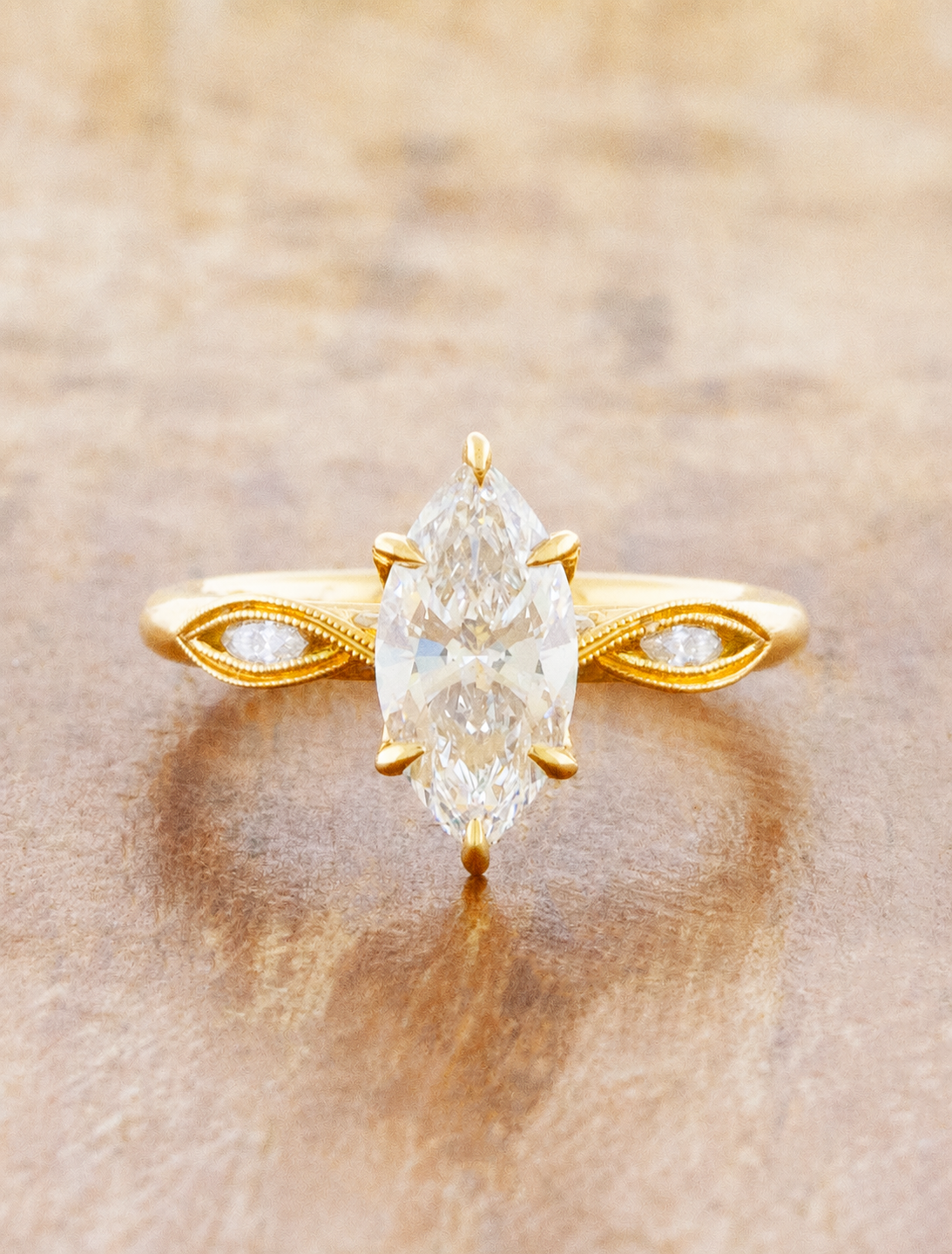 caption:Shown with 1ct marquise in 18k yellow gold 